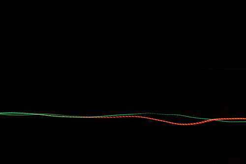 long exposure gray and red wavy lines green